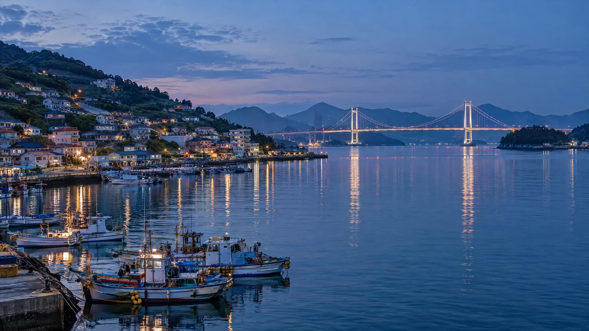 An AI landscape of a south-coast harbor and bridge at blue hour
